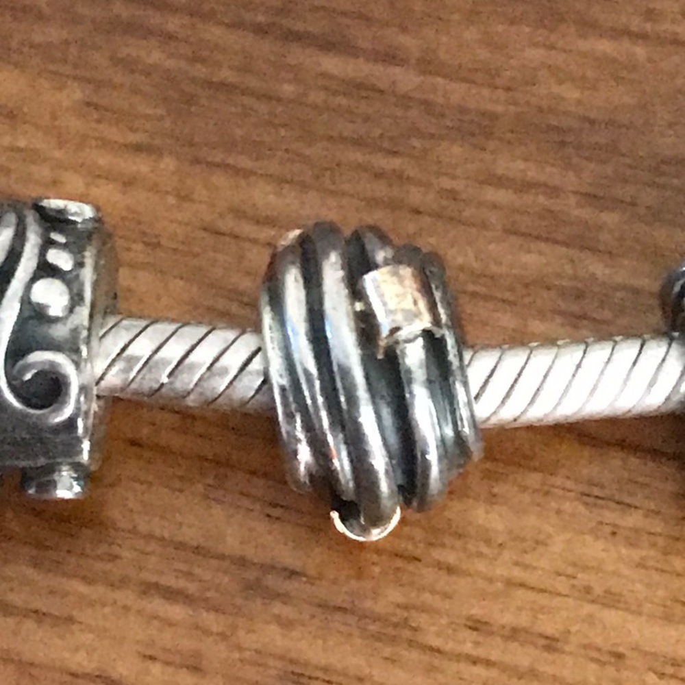 Pandora swirl charm